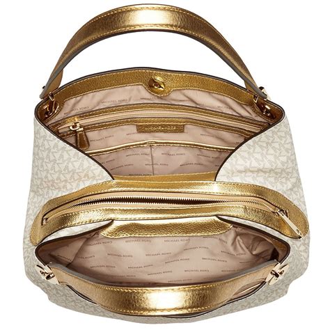 michael kors raven large pocket shoulder bag gold